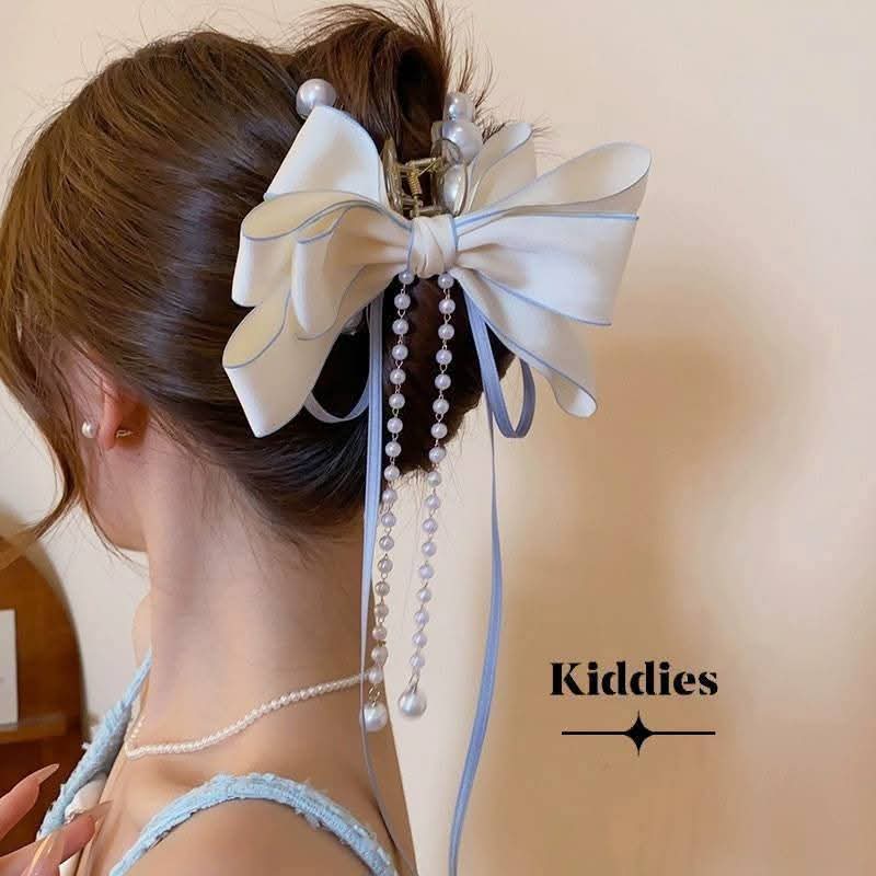 Pearl bow punch clip